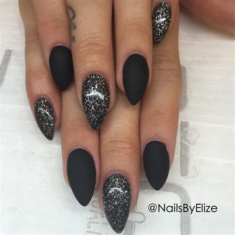 matte black and sparkle nails